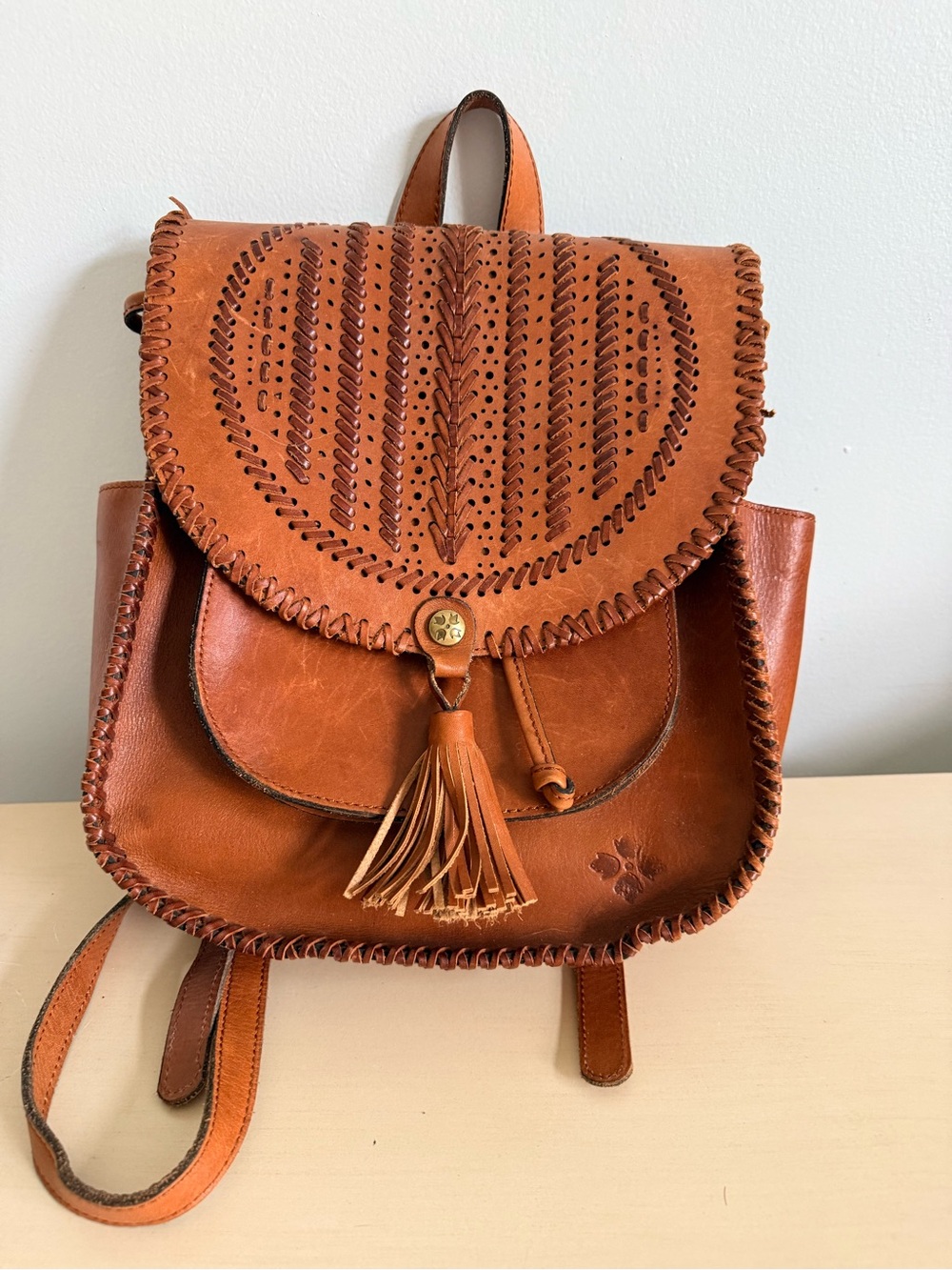 Patricia Nash Saddle Brown Leather Perforated Tassel Backpack